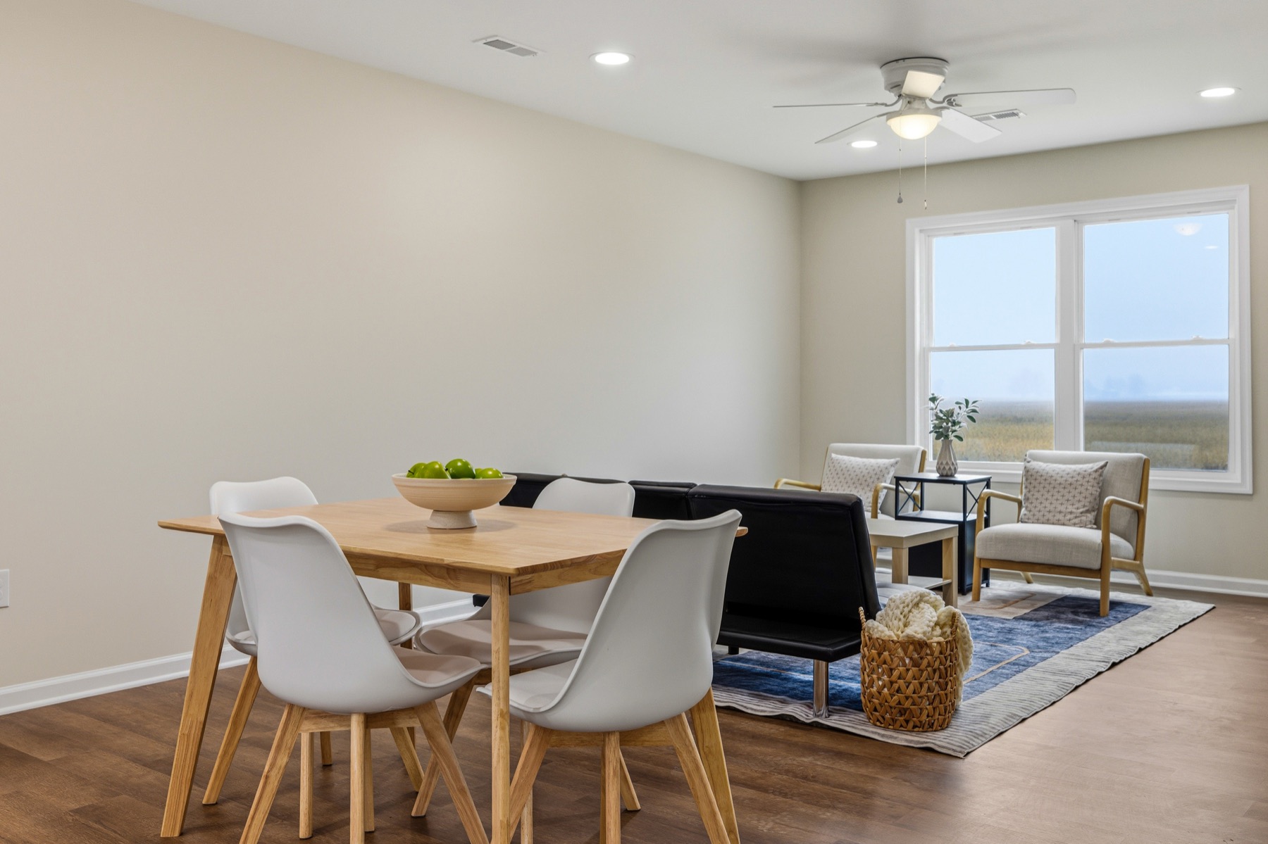 Dining area opening into the living room on the main floor